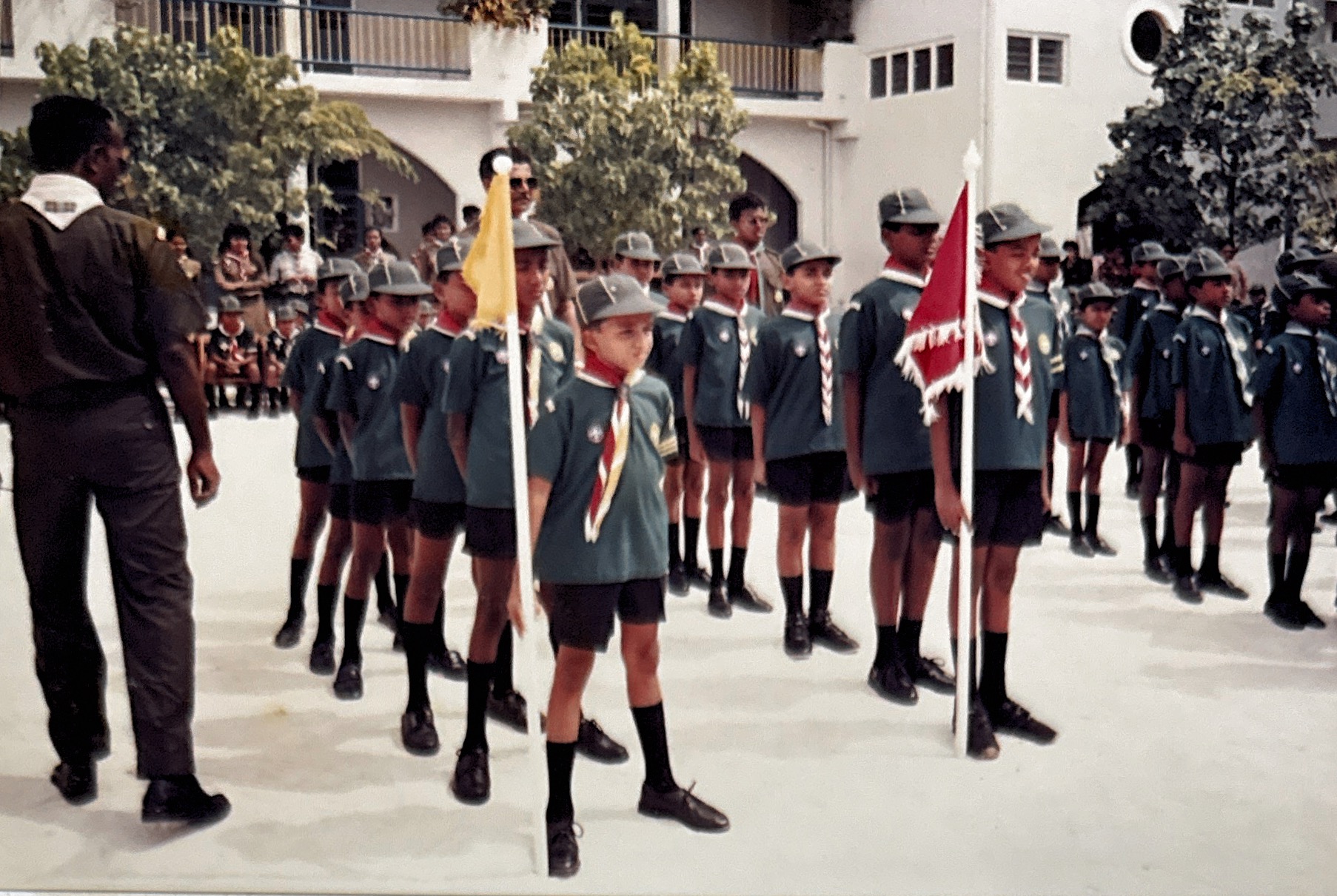 3 2nd Interschool Cub Scout Competition 1991 Thaajuddeen School with their yellow flag beside Iskandar School. Smartness and good orders inspection ongoing